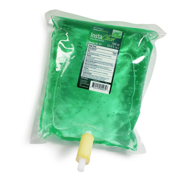 A green medical fluid bag with a white valve at the bottom.
