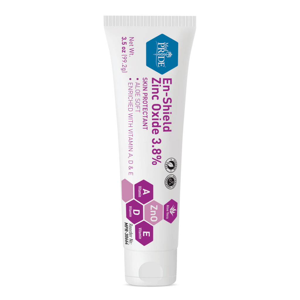 Tube of Enchanteur Extra White toothpaste with floral design.