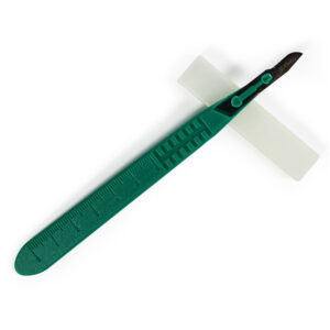 Green-handled scalpel with a sharp blade isolated on white.