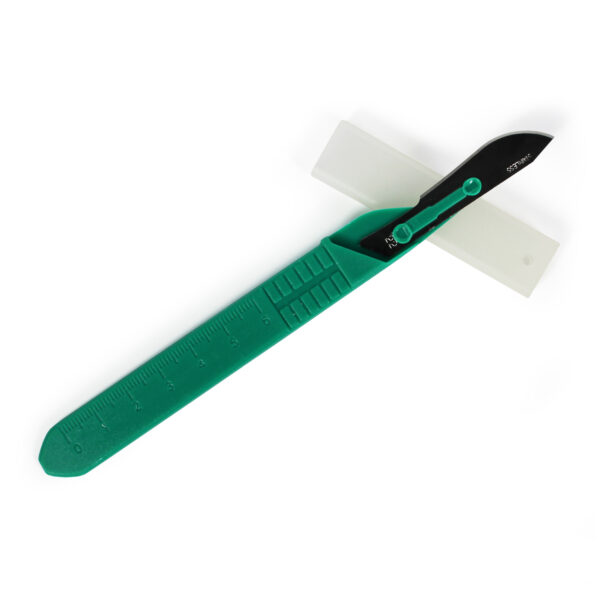 A scalpel with a green handle and a sharp blade.