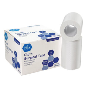 Cloth surgical tape with dispenser and box packaging.