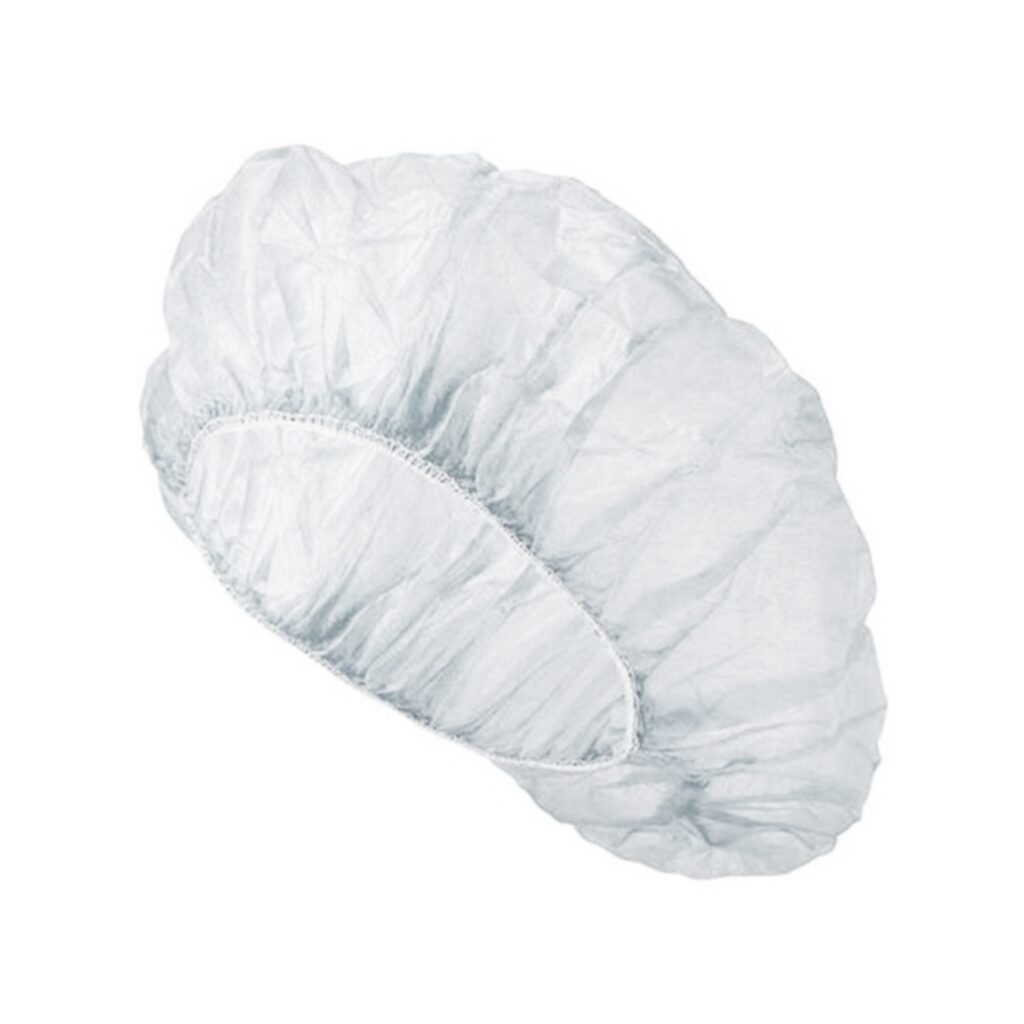 White disposable bouffant cap for hygiene purposes.