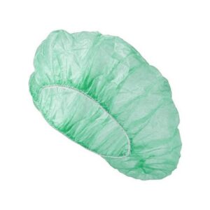 A light green disposable bouffant cap for hygiene purposes.