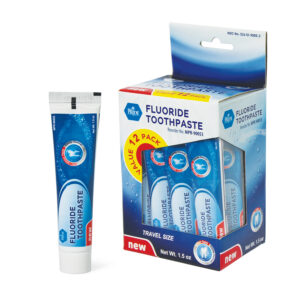 Fluoride toothpaste tube and display box with four tubes.