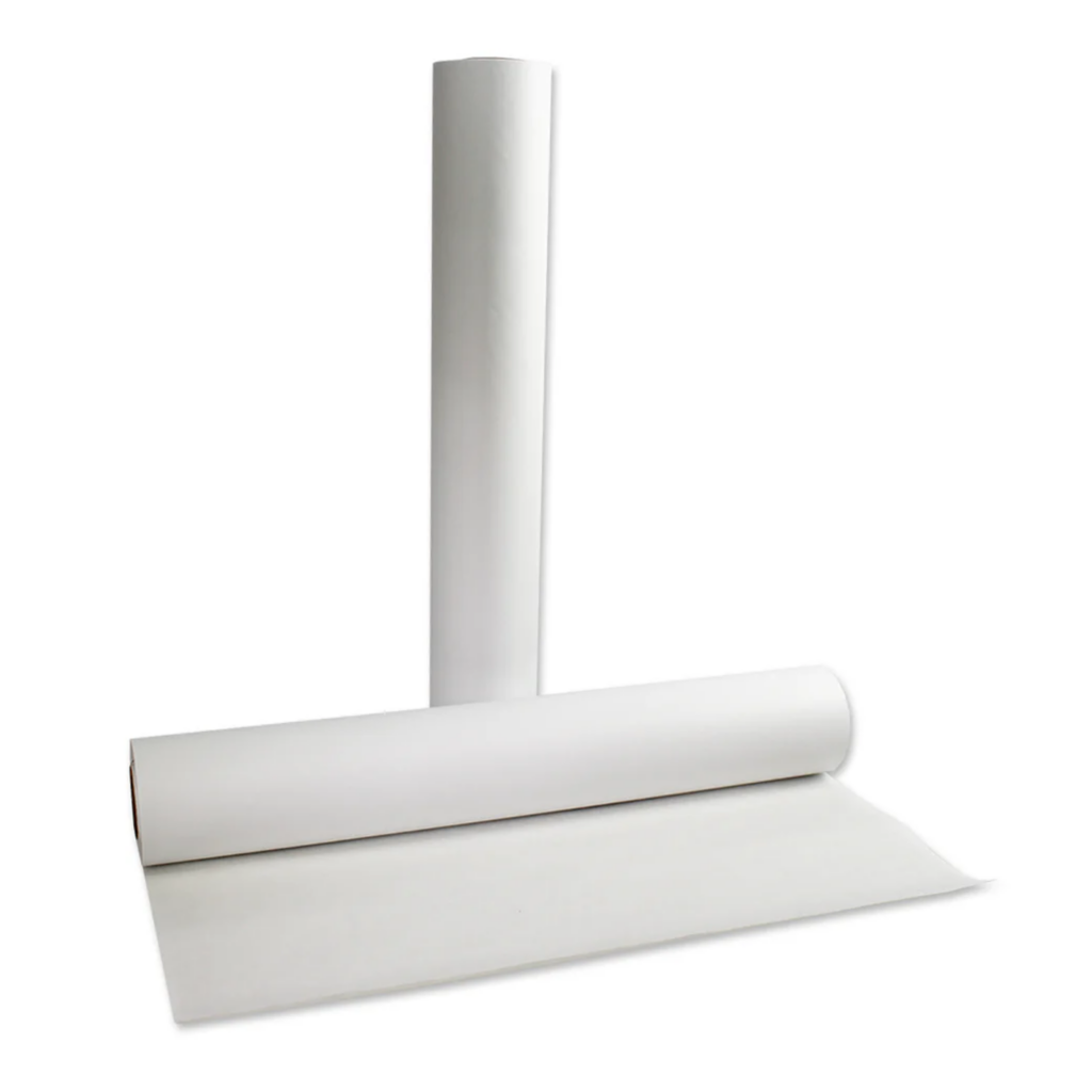 Two rolls of white paper, one standing and one lying down.