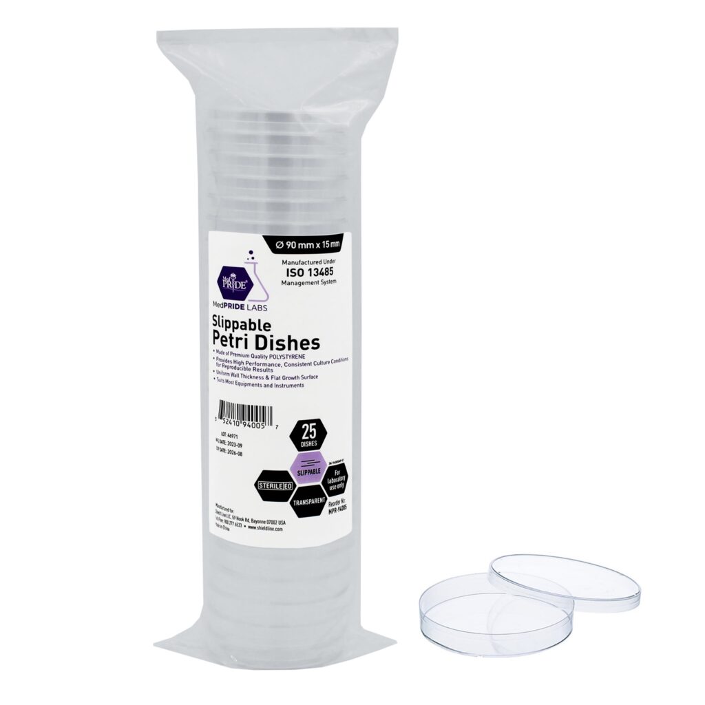 Stack of clear plastic petri dishes with lids on a white background.