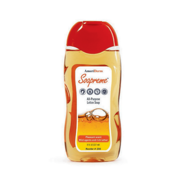 Bottle of golden syrup with a red cap and label.