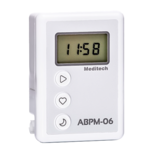 Digital medical device ABPM-06 displaying time 11:58.