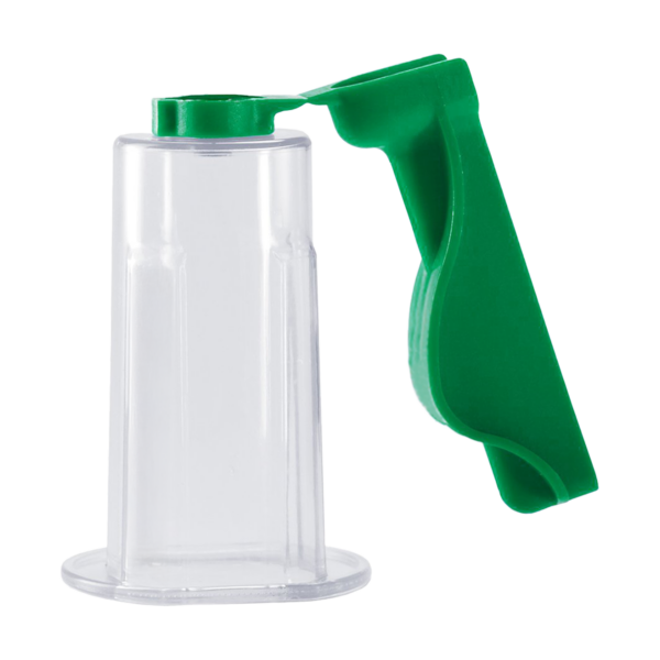 Green-handled manual suction device with a clear plastic cup.